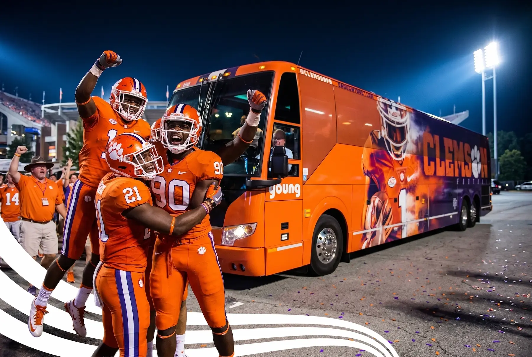 Clemson football players boarding a Young Transportation charter bus at night